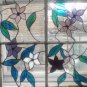 Old time wooden window frame with floral inserts