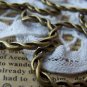 10 pcs Antique Bronze Twisted Heart Pendants Charms A1510