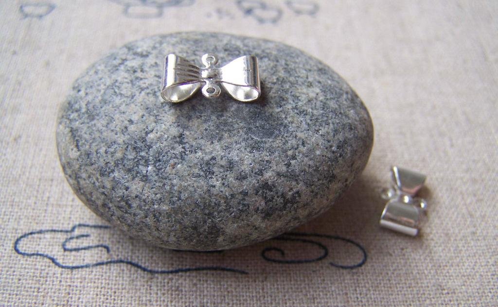 20 pcs of Silver Tone Bow Tie Knot Connector 7x12mm A4478