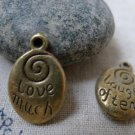 10 pcs Antique Bronze Laugh Often Love Much Spiral Oval Charms A5982