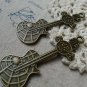 10 pcs Antique Bronze Guitar Charms Pendant 22x63mm A5576