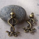 10 pcs of Antique Bronze Skull And Two Snakes Charms 15x37mm A3748