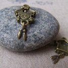 10 pcs Antique Bronze Cuckoo Bird Clock Charms 13x28mm A242