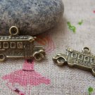 10 pcs of Antique Bronze School Bus Charms Double Sided 9x23mm A928