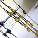 Super long 4.5 inch stiletto earrings beaded with golden yellow celestial crystal beads