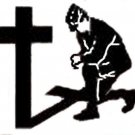 Military Man Kneeling at Cross