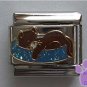Brown cat napping on blue glitter bed Italian Charm