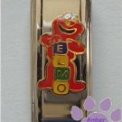 Elmo Super Link Italian Charm playing with blocks to spell name