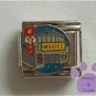 Movie Theater Italian Charm on a blue glitter disc