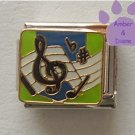 Music Italian Charm with treble clef, music staff and music note