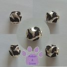 Sharks in Relief Sterling Silver Slider or Bead against black background