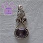 Amethyst Oval Sterling Silver Pendant in a simple frame