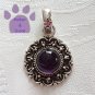 Amethyst Round Sterling Silver Pendant in a scalloped frame