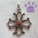 Sunstone Oval Sterling Silver Pendant in an intricate cross frame
