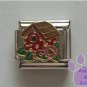 Red Bird House Italian Charm among flowers