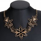 Gold Tone Flower Necklace with Black Crystals Gold Tone Flower Necklace with Black Crystals