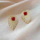 Beautiful Modern Crystal Heart With 925 Silver Post Red CZ Earrings Beautiful Modern Crystal Heart With 925 Silver Post Red CZ Earrings