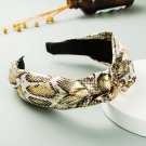 Top-Selling Retro Knotted Snake Pattern Faux Leather Wide-Brimmed Headband Top-Selling Retro Knotted Snake Pattern Faux Leather Wide-Brimmed Headband