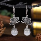 Retro Silver Butterfly Sitting On Top Of White Chalcedony Ball Hook Earrings Retro Silver Butterfly Sitting On Top Of White Chalcedony Ball Hook Earrings