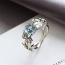 Charming Rhodium Plated 925 Sterling Silver Leaf Ring Blue Topaz - many sizes Charming Rhodium Plated 925 Sterling Silver Leaf Ring Blue Topaz - many sizes