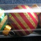 A Set of 8-Piece Glittery Gold-Strips Colorful "Celebrate It Christmas" Decorations