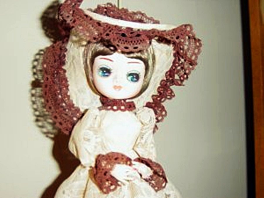 vintage music box doll