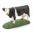 Porcelain Cow Figurine