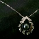 18k white gold diamond necklace w/ large Tahitian pearl