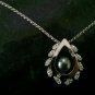 18k white gold diamond necklace w/ large Tahitian pearl
