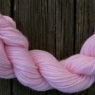 100%  wool yarn, worsted weight, soft pink,  1 skein