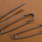 Two stitch holders and two big-eye needle,  steel, 55mm