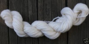 100%  wool yarn, worsted weight, off-white ,  1 skein