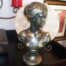 Copper female figurine