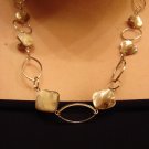 Silver chain link necklace with colored mother of pearl bead
