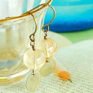 Nice and clear bead with little bronze coin