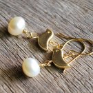 Mother bird's and her precious egg earrings