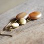 Light peach fresh water pearl coin with texture bead