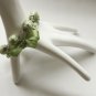 Apple green cotton beads and green satin ribbon bracelet