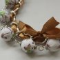White floral cotton beads and brown satin ribbon bracelet