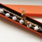 White floral cotton beads and brown satin ribbon bracelet