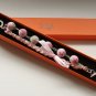 Rose cotton beads and rose satin ribbon bracelet