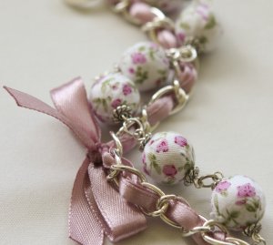 Cotton beads and lilac satin ribbon bracelet