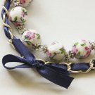 Cotton beads and blue satin ribbon bracelet