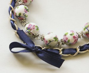 Cotton beads and blue satin ribbon bracelet