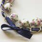 Cotton beads and blue satin ribbon bracelet