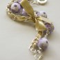 Violet cotton beads and yellow satin ribbon bracelet