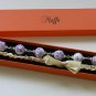 Violet cotton beads and yellow satin ribbon bracelet