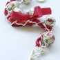 White floral cotton beads and red satin ribbon bracelet