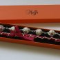 White floral cotton beads and red satin ribbon bracelet