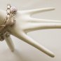 White floral cotton beads and beige satin ribbon bracelet